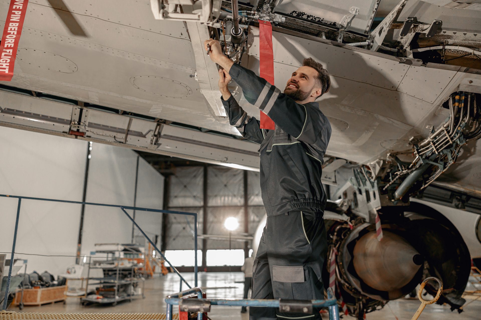 Engineer at work on an aircraft in the hangar